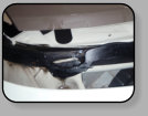 A Nissan Murano that had a previously installed windshield done with very poor workmanship.